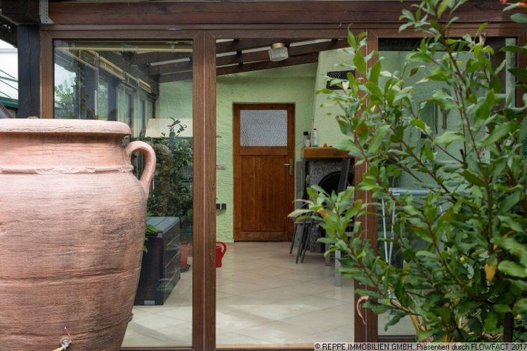 Wintergarten mit Kamin